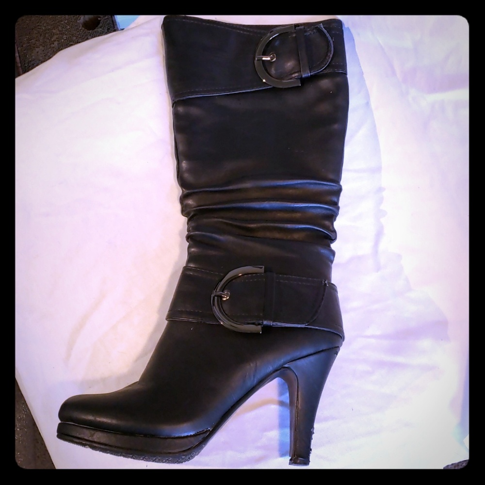 Knee high black boots with buckles